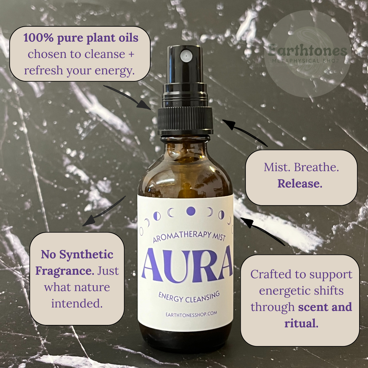 Aromatherapy mist bottle labeled 'Aura' with text about plant oils and energy cleansing on a textured background.