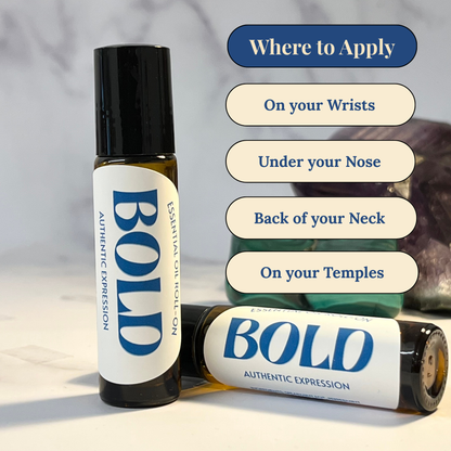 Two 'BOLD' essential oil roller bottles with application instructions on a neutral background.