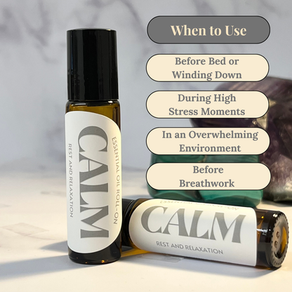 Two bottles of 'Calm' essential oil roll-ons with usage tips on a light background