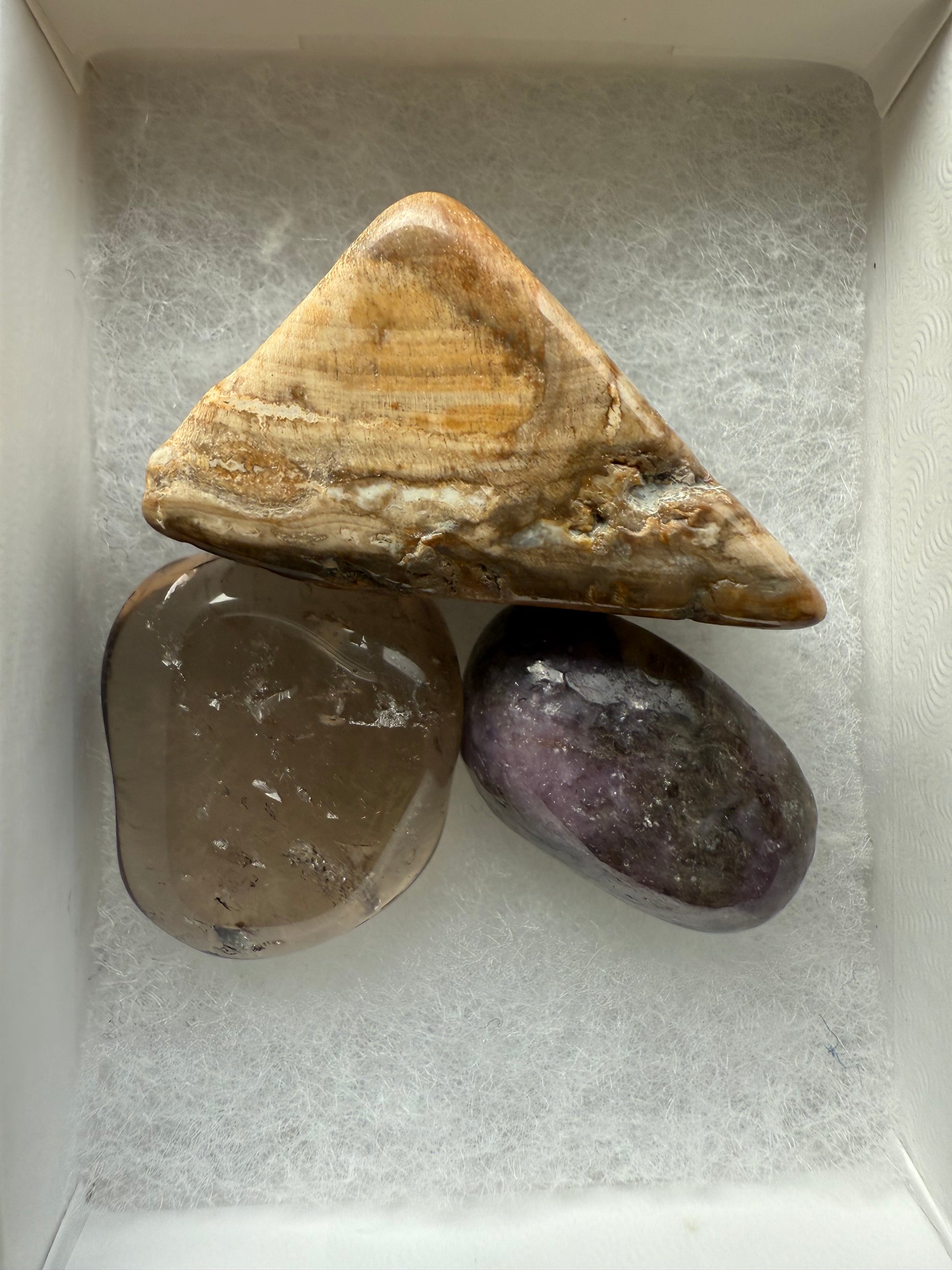 3 crystals on white background