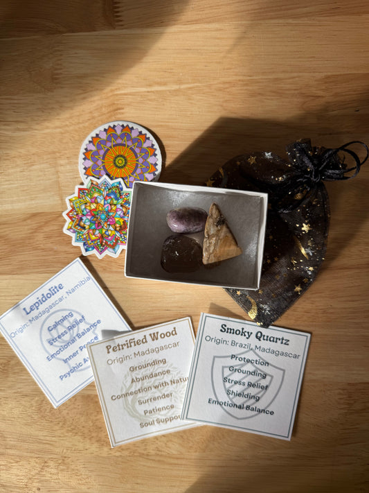 Crystal samples with descriptive cards and stickers on a wooden surface