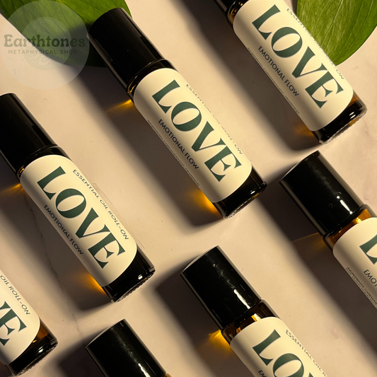 Roll-on bottles labeled 'LOVE' on a neutral background