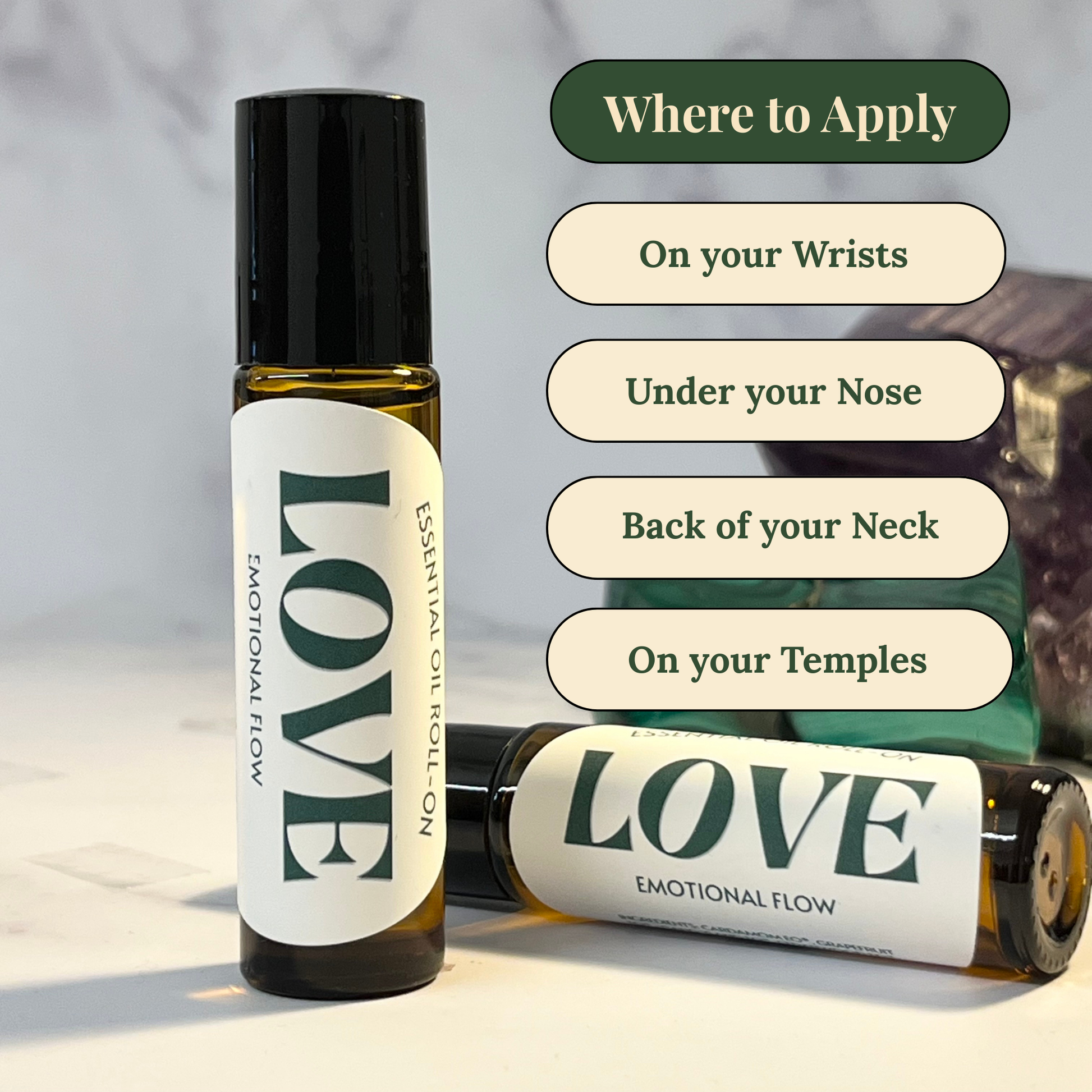 Two 'LOVE' essential oil roll-ons with application instructions on a neutral background