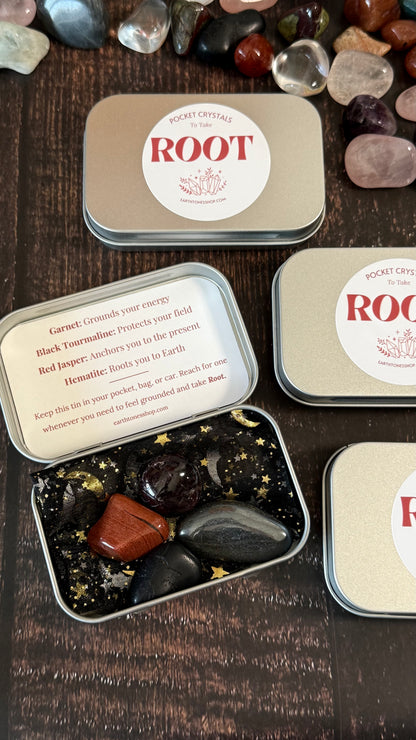 Garnet, Black tourmaline, Red Jasper & Hematite in tin on faux wood background 
